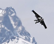 Swiss ‘Fusion Man’ Flies Over the Alps With Jet-Propelled Wings